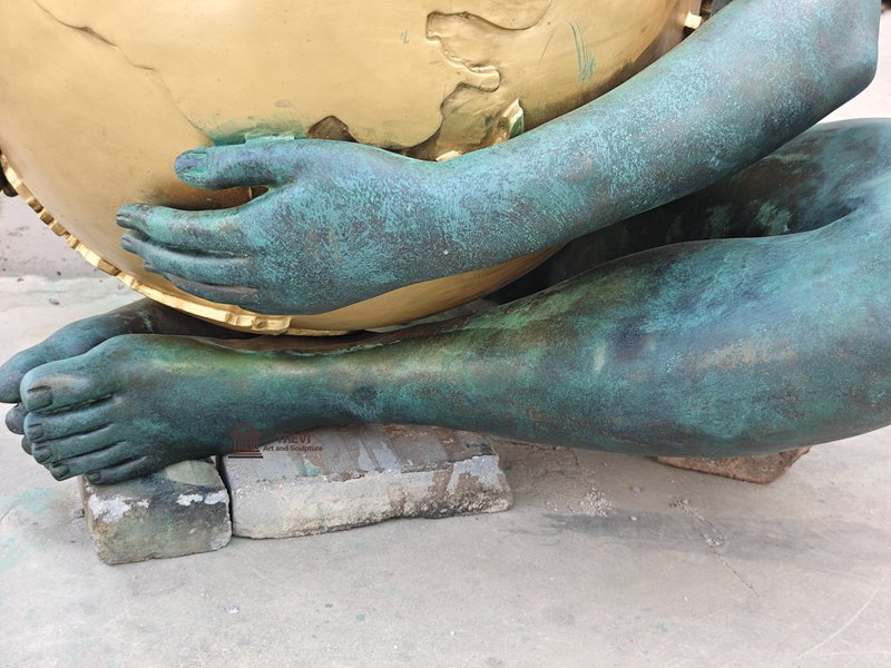 Bronze mother nature statue detail