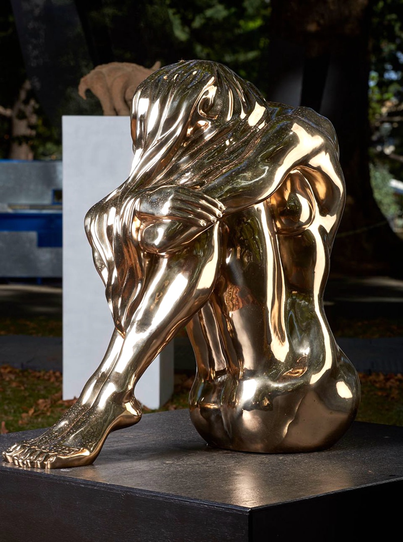 Stainless Steel Sitting Girl Statue Introduction
