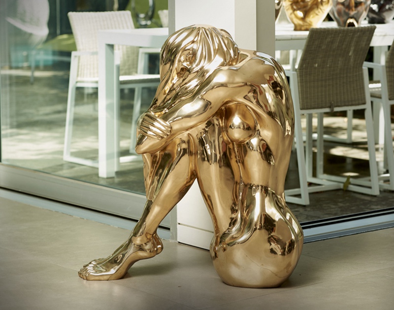 Stainless Steel Sitting Girl Statue Introduction
