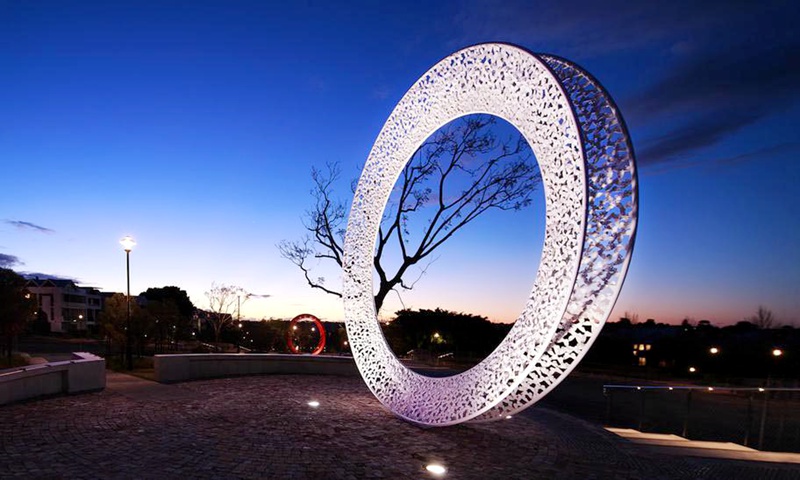 White Metal Circle Sculpture Introduction