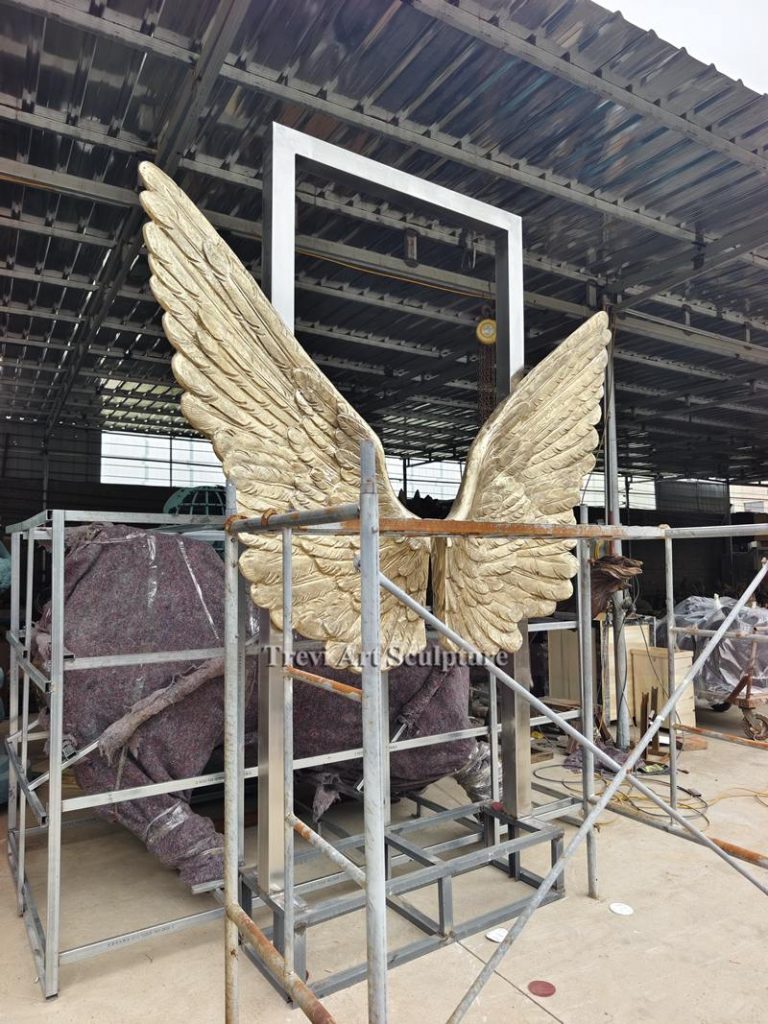 Bronze wings sculpture