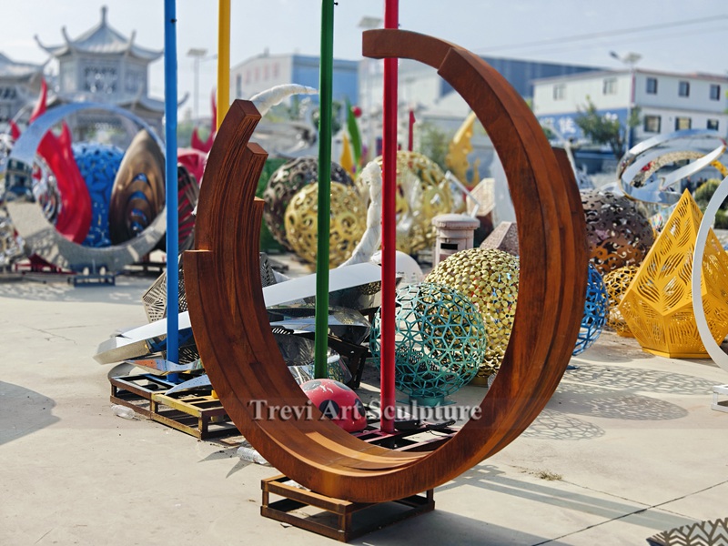 Large modern corten circle garden sculptures