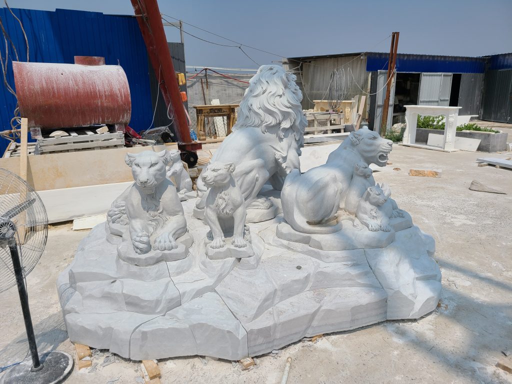 Marble lion family statues