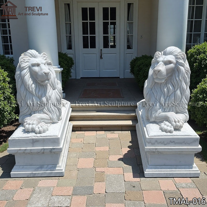 White stone lion statue in front of house