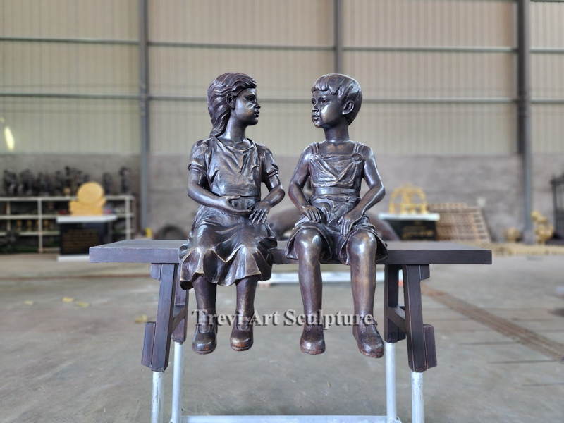 bronze children statues