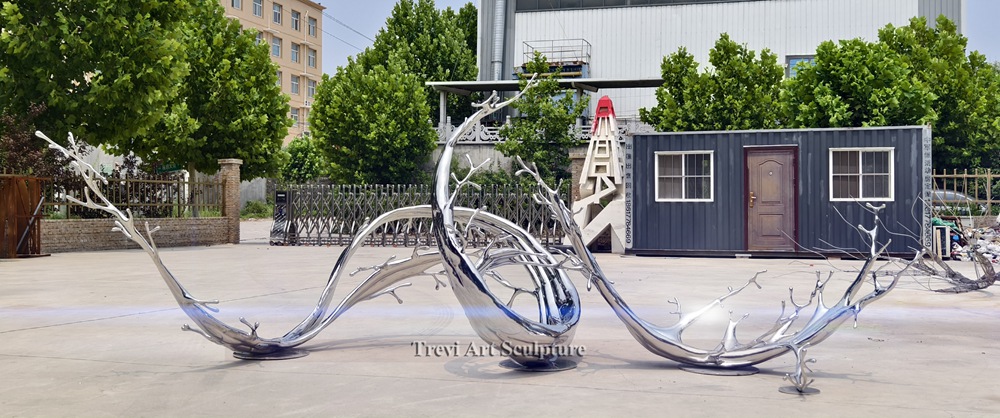 large stainless steel water splash sculpture detail