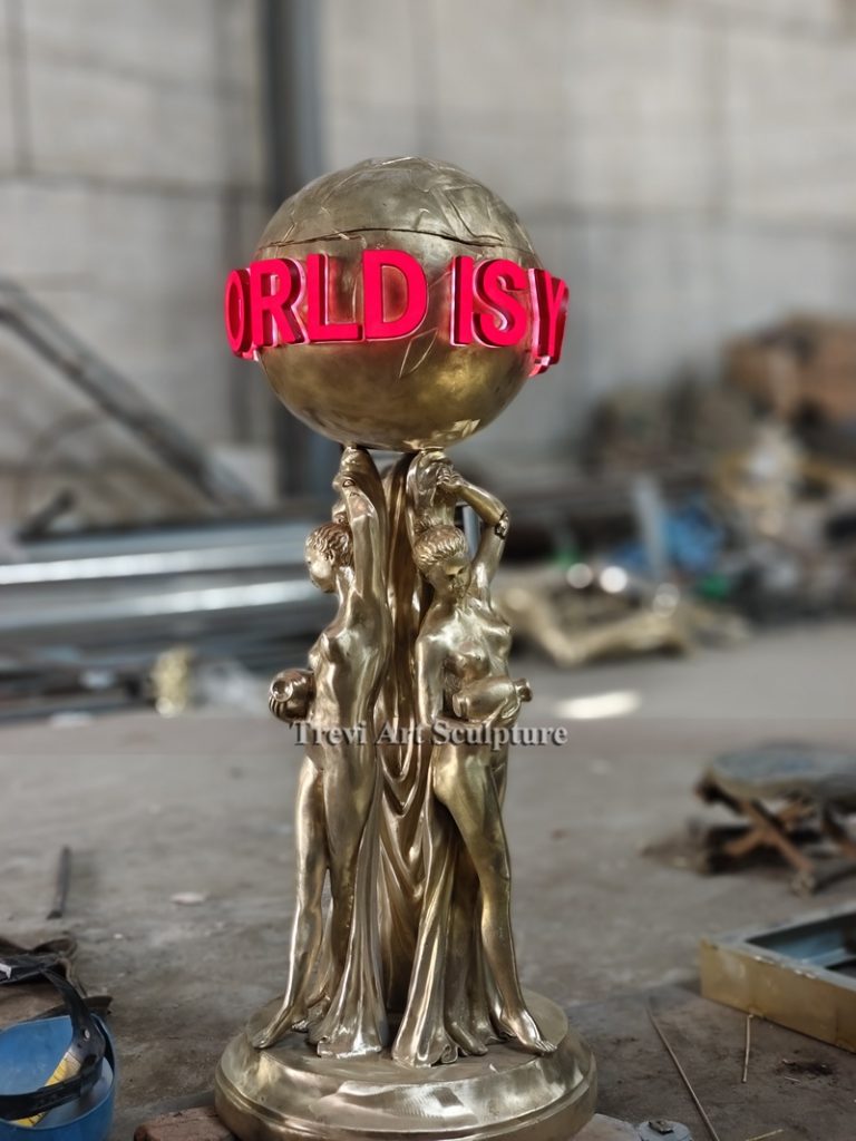 bronze the world is yours statue with lighting