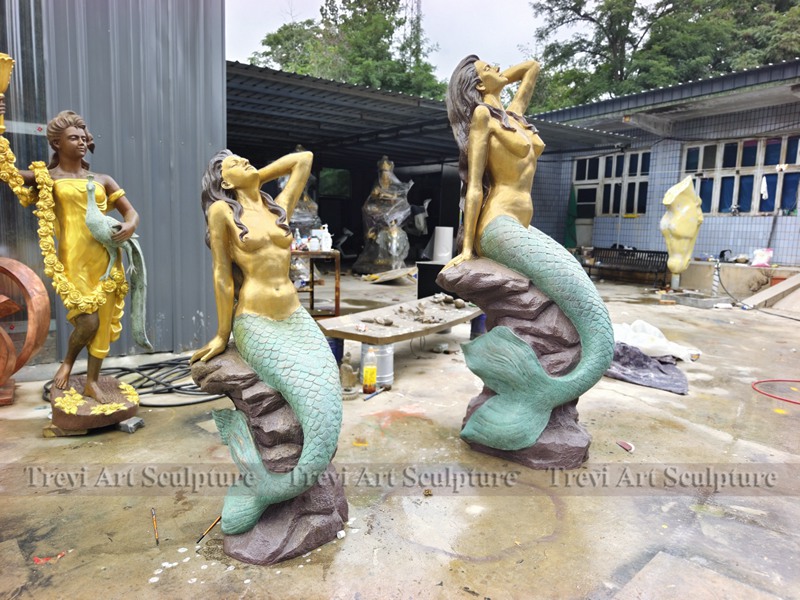 Bronze mermaid sculpture