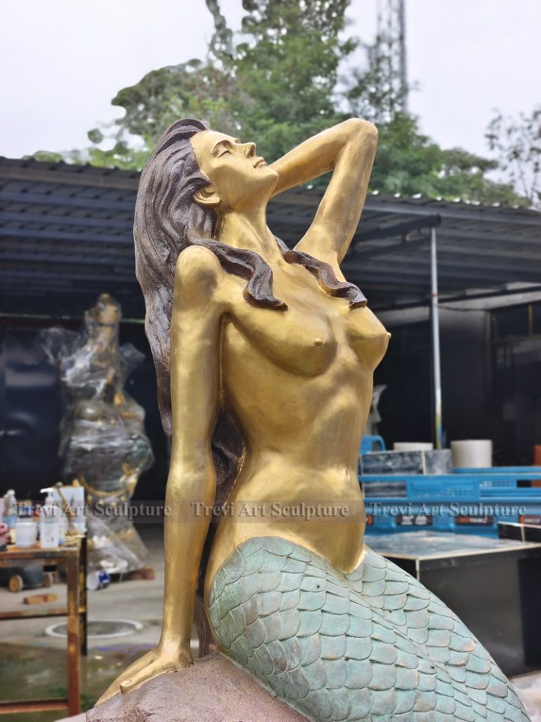 Bronze mermaid statue