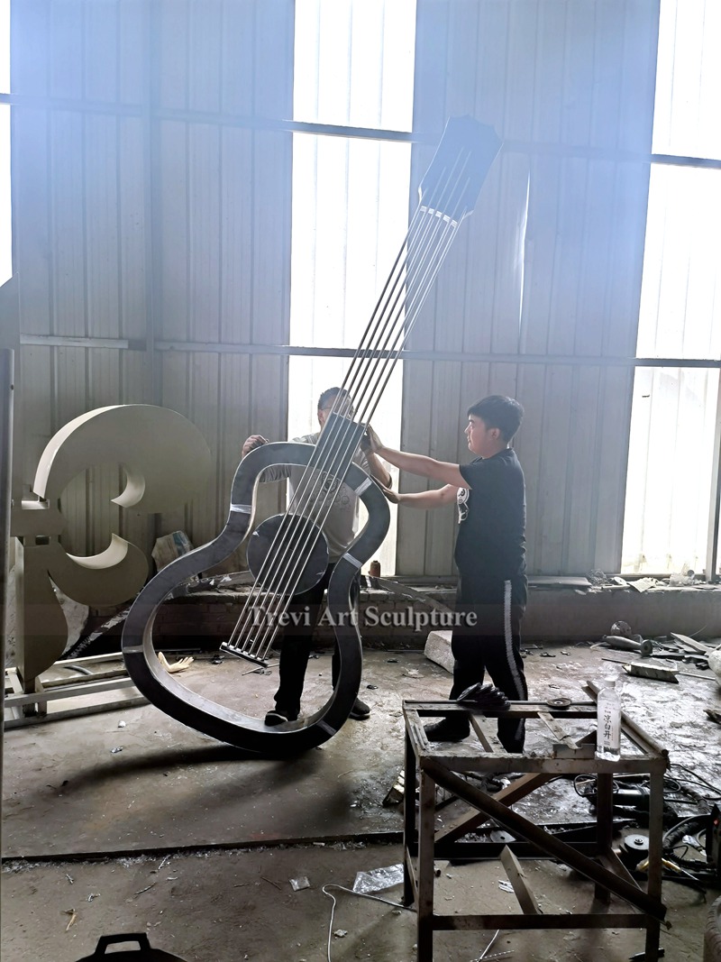Large metal guitar sculpture