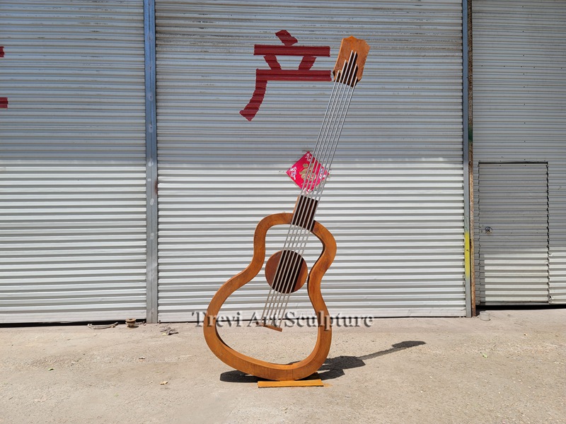 modern Corten steel guitar sculpture