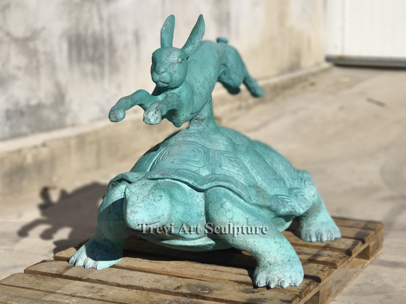 Bronze turtle and rabbit sculpture
