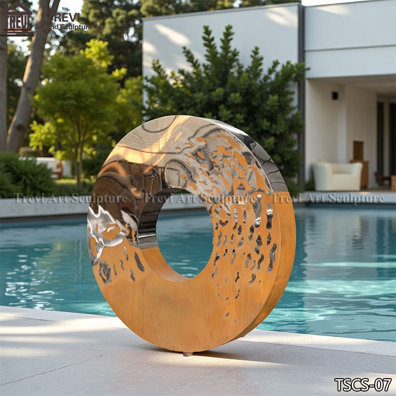 Stainless and corten steel circle sculpture