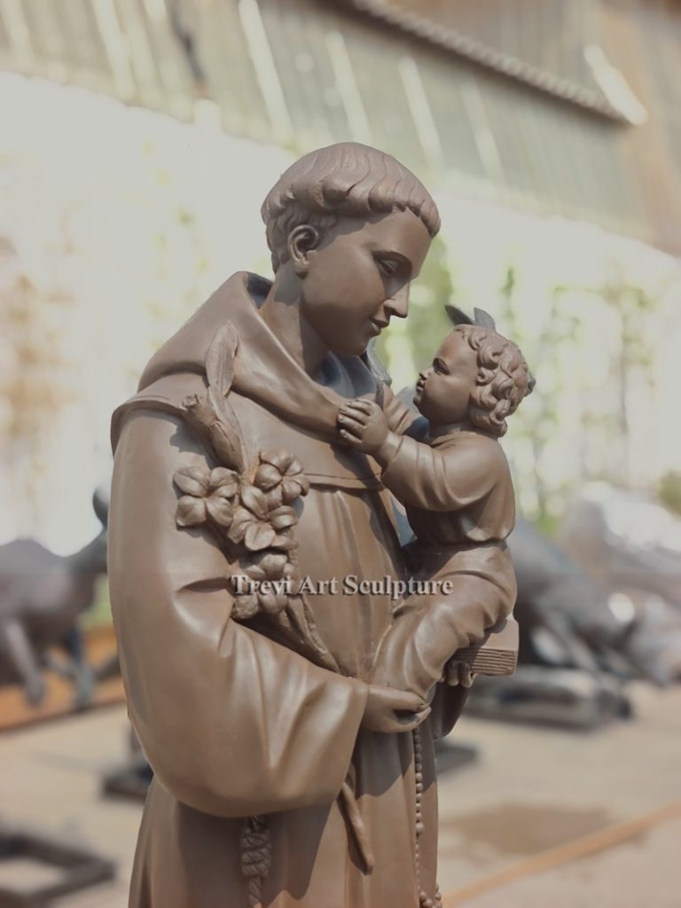 outdoor saint anthony statue holding baby jesus