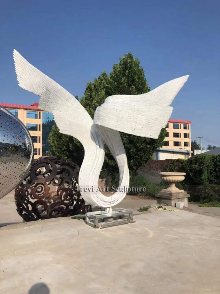 white Metal ribbon sculpture