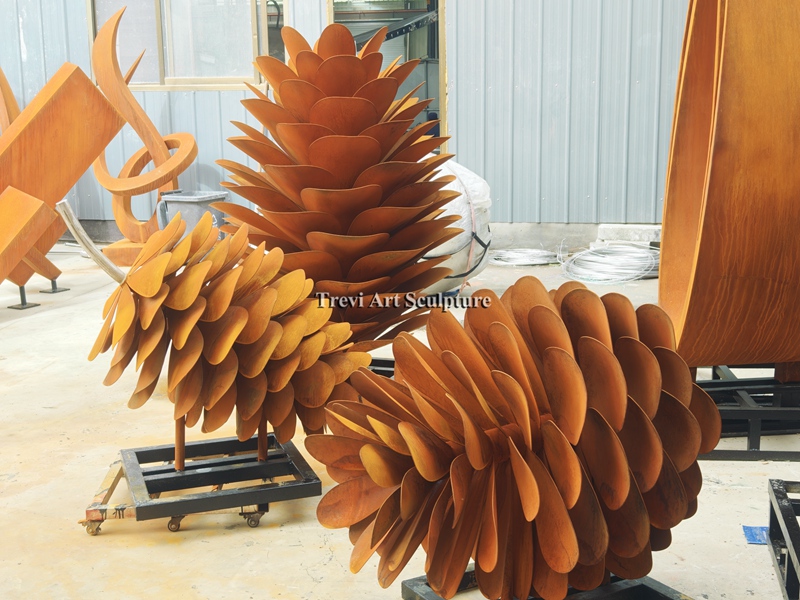 three Pine Cone Sculptures