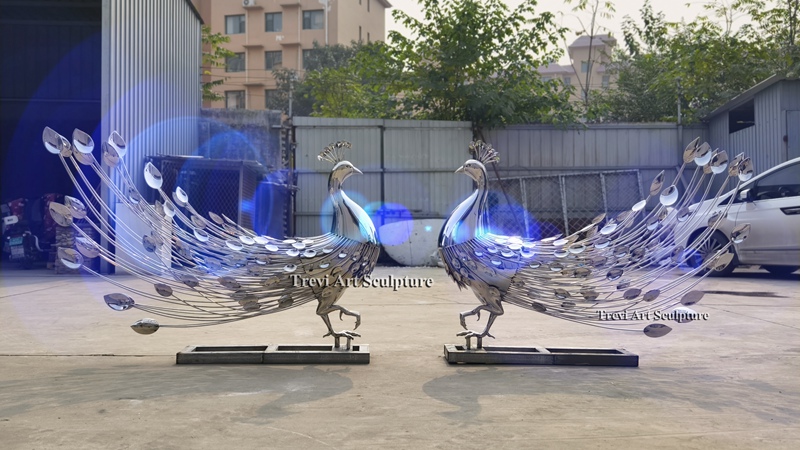 Large Polished Metal Peacock Statues