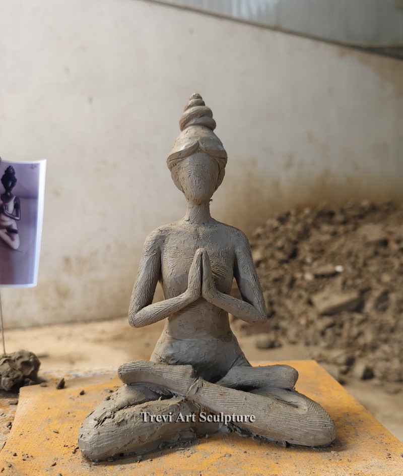 yoga statue clay model