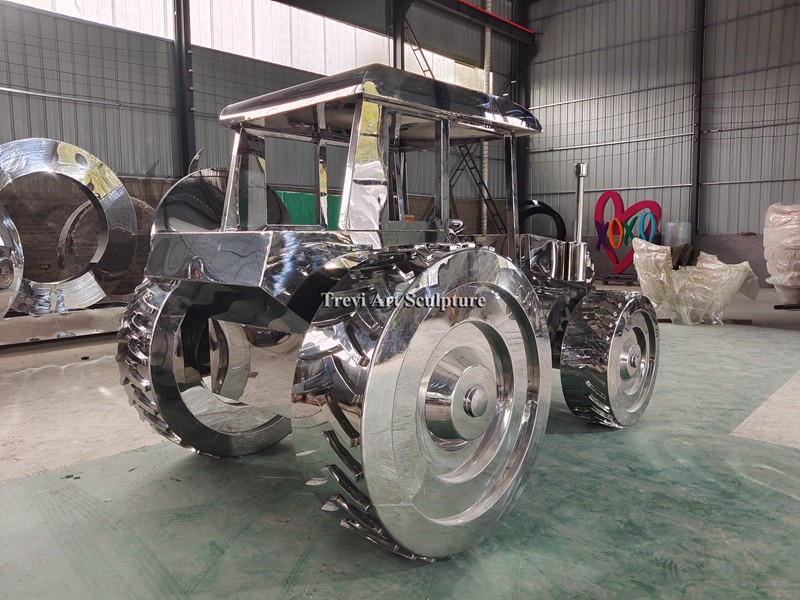 Stainless steel tractor sculpture