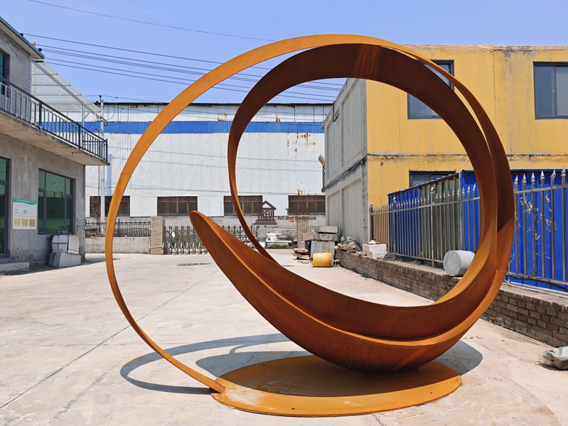 corten steel abstract statue
